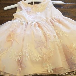 Star and sparkle pink dress
